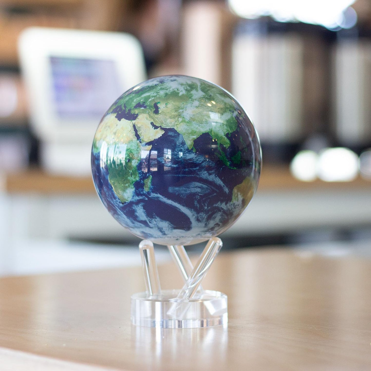 Solar-Powered Rotating Globe with Clouds